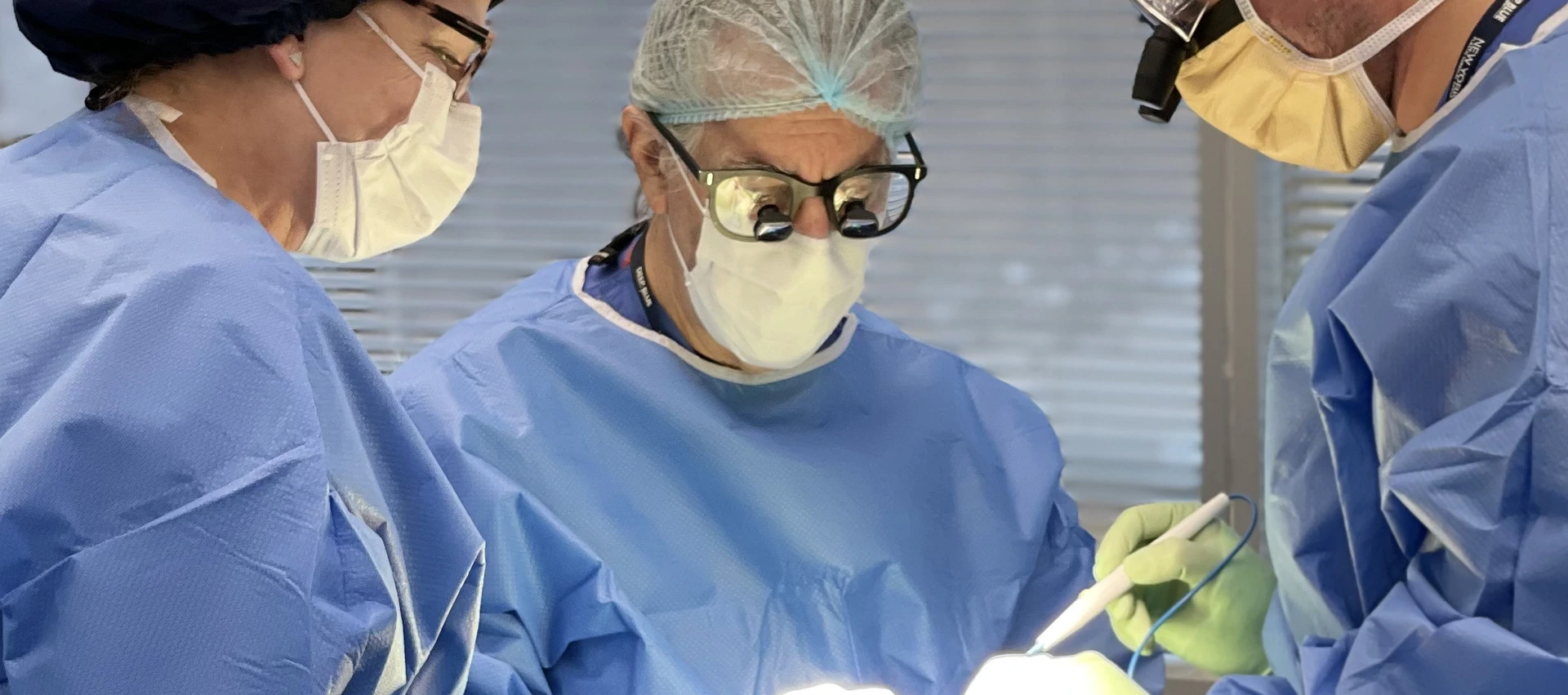 Doctor Barry Douglas in the operating room. patient testimonial banner image