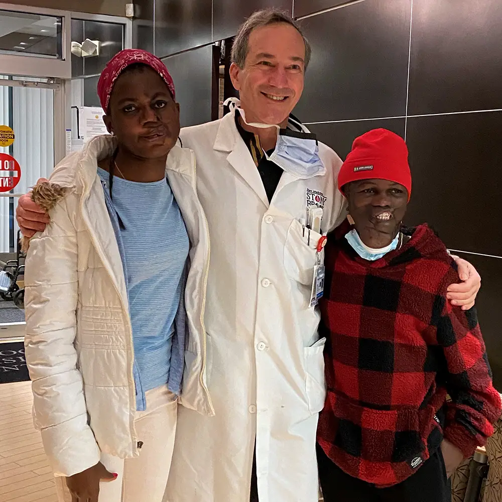 dr. dagumm with happy patient