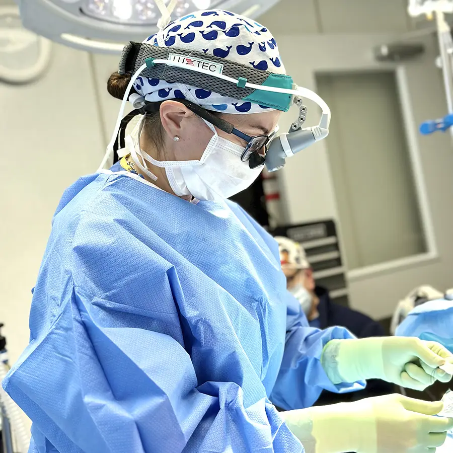 Dr. Ruotolo performing a procedure in an operating room