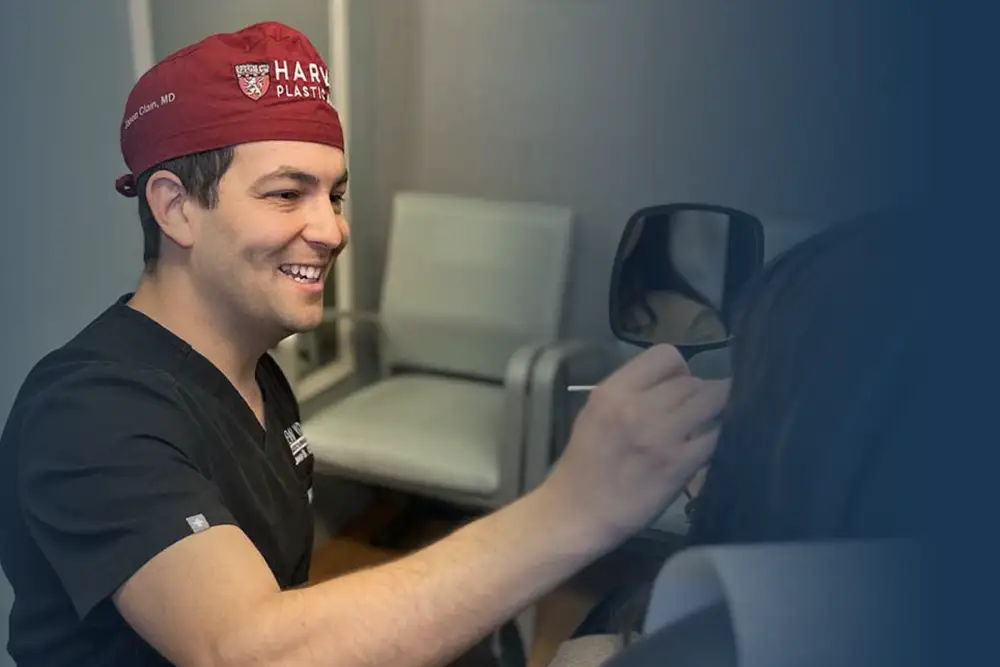 doctor and patient reviewing rhino revision together