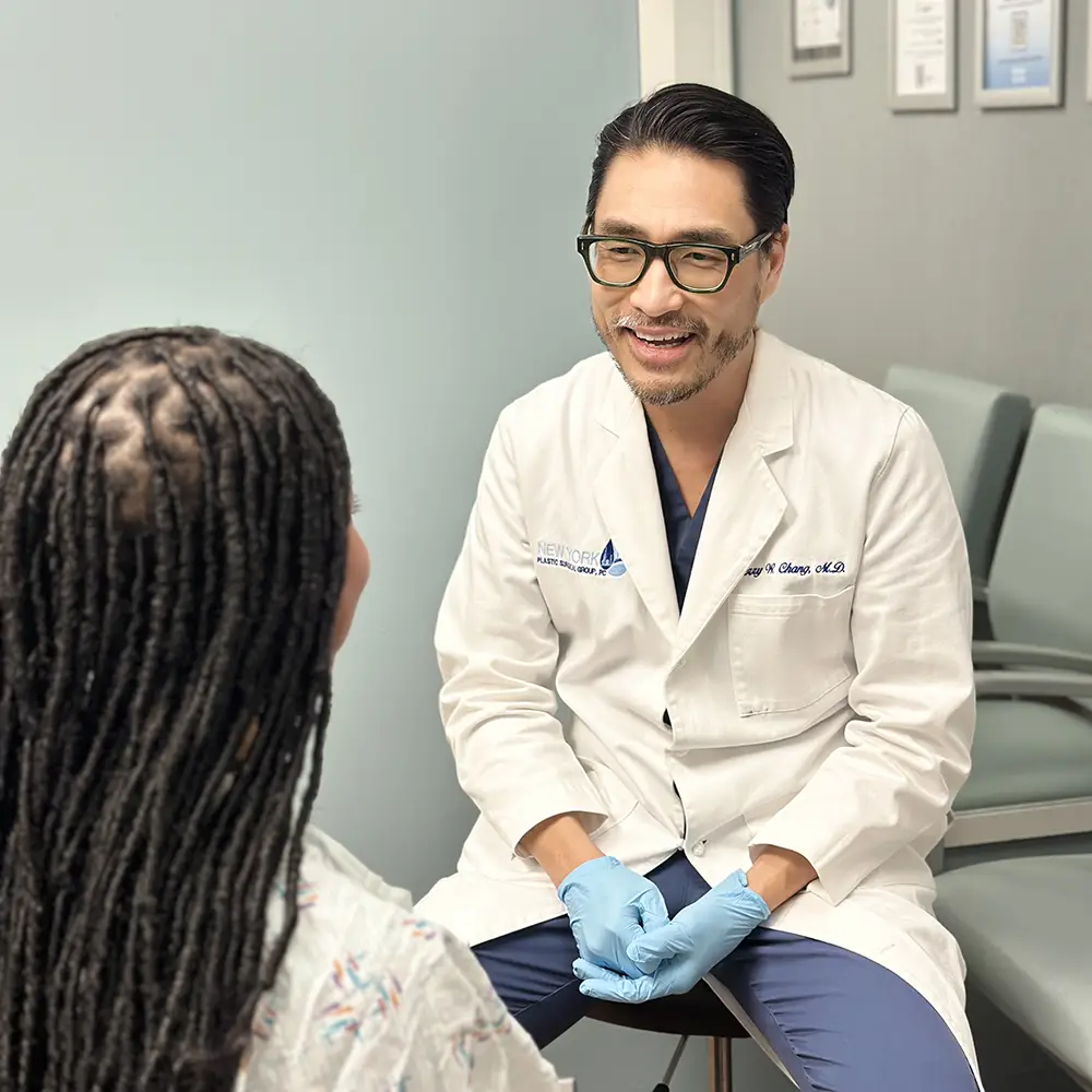 Dr. Chang with a patient